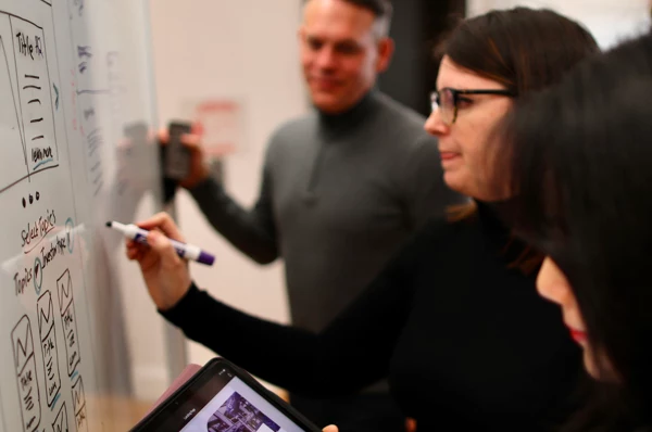 team digital marketing working-session strategy whiteboard